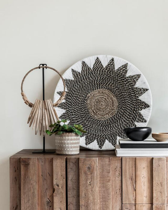 Decorative wooden necklace on an stand